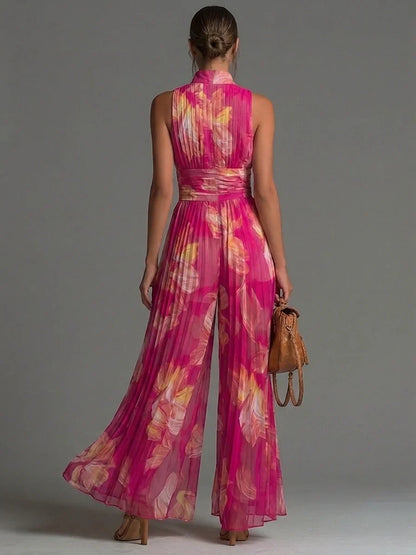 Mono de chifón plisado con estampado floral fucsia