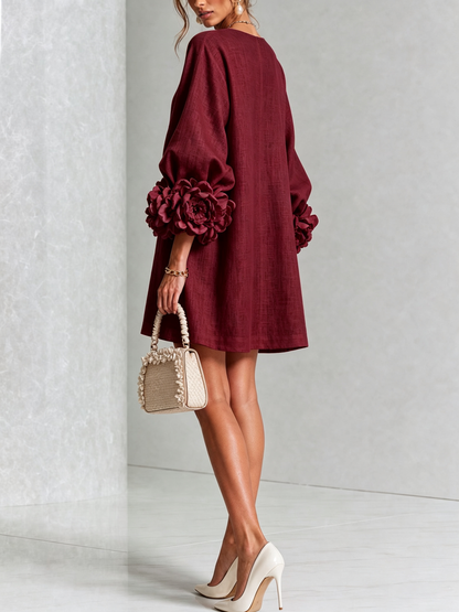 Mini vestido con botones y mangas florales