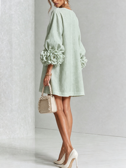 Mini vestido con botones y mangas florales