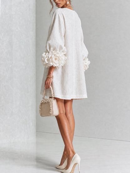 Mini vestido con botones y mangas florales
