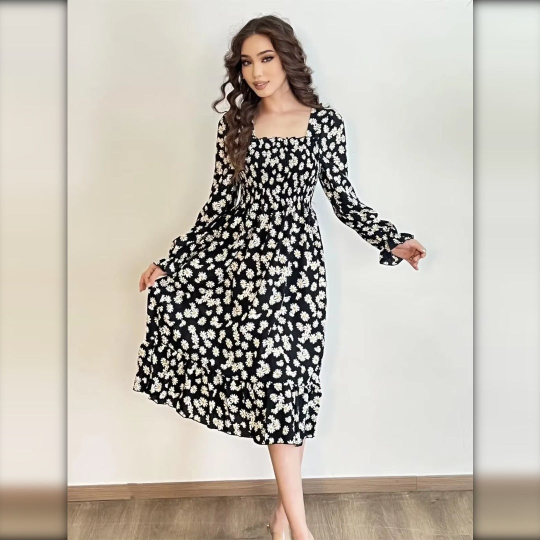 Vestido midi floral negro margaritas