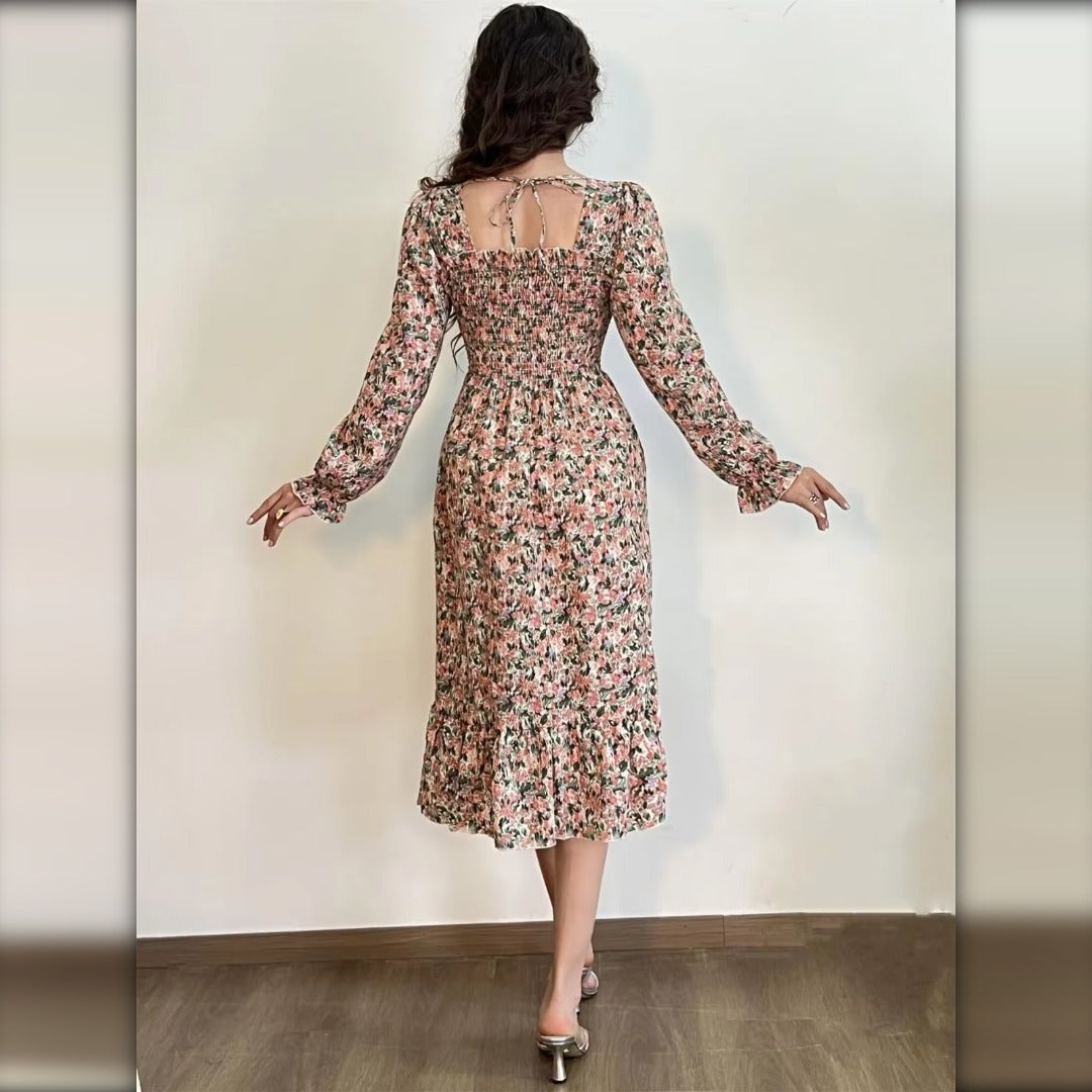 Vestido midi floral beige espalda