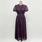 Vestido largo de gasa morado maniquí
